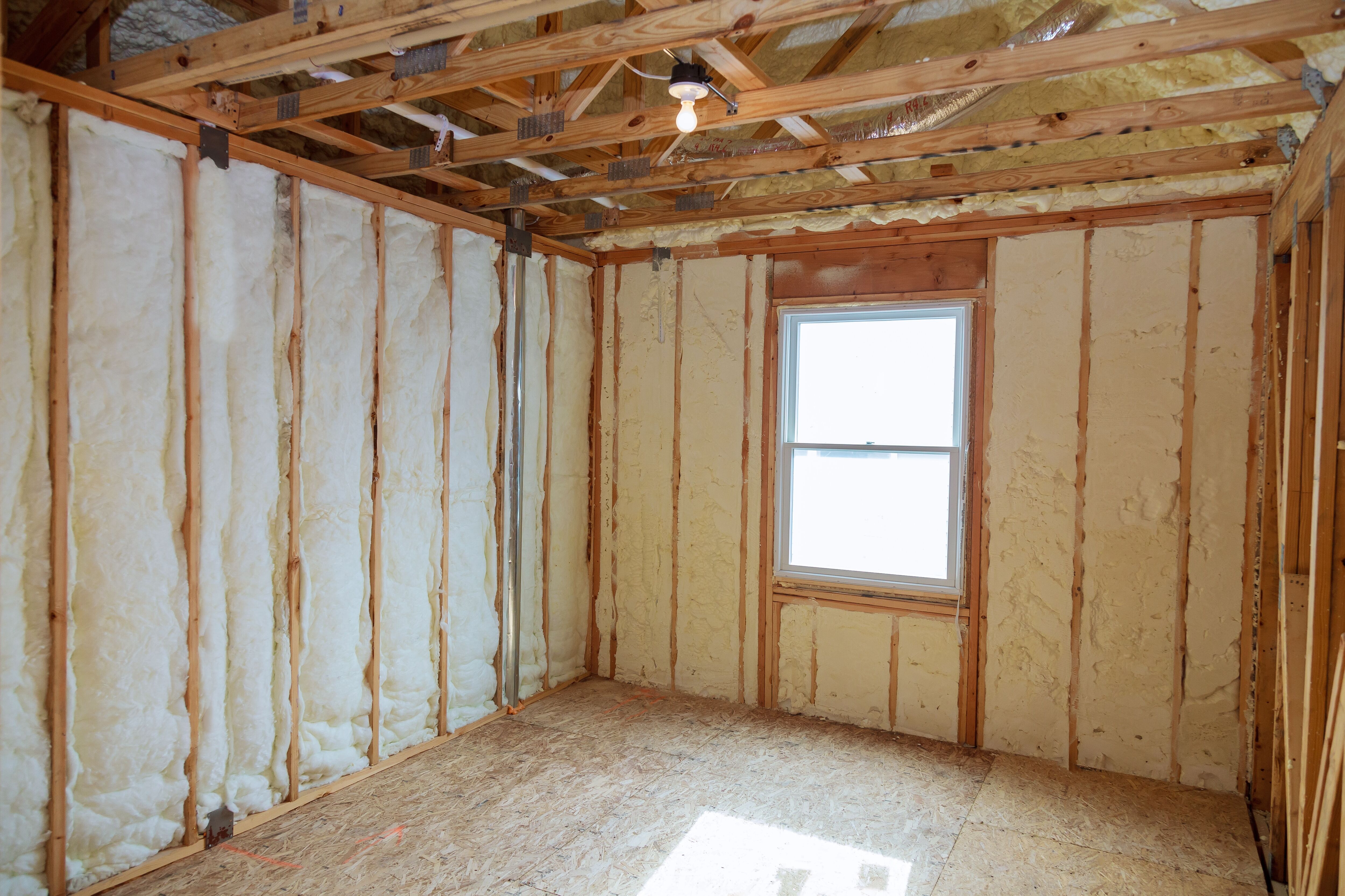 Insulation-of-attic-with-fiberglass